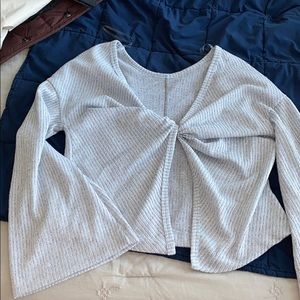 Cross in the back, beautiful bell sleeves